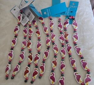 10 Strands Of Ceramic Pink Flamingo Beads.
